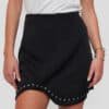 Falda Tachas