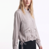 Blusa de Satín con Bolsillos y Ajuste Inferior
